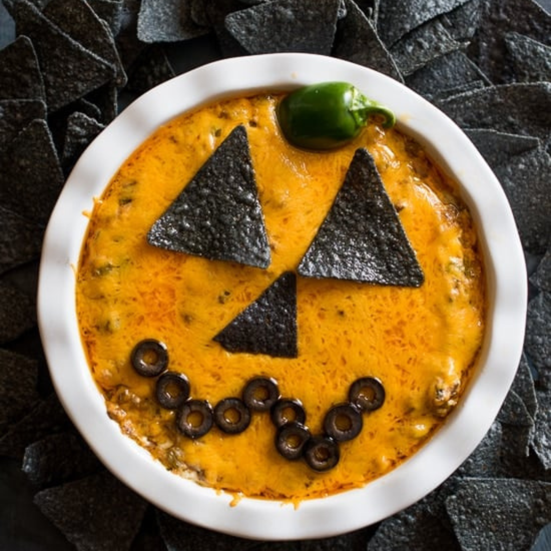 Jack-O-Lantern Cheesy Beef Taco Dip